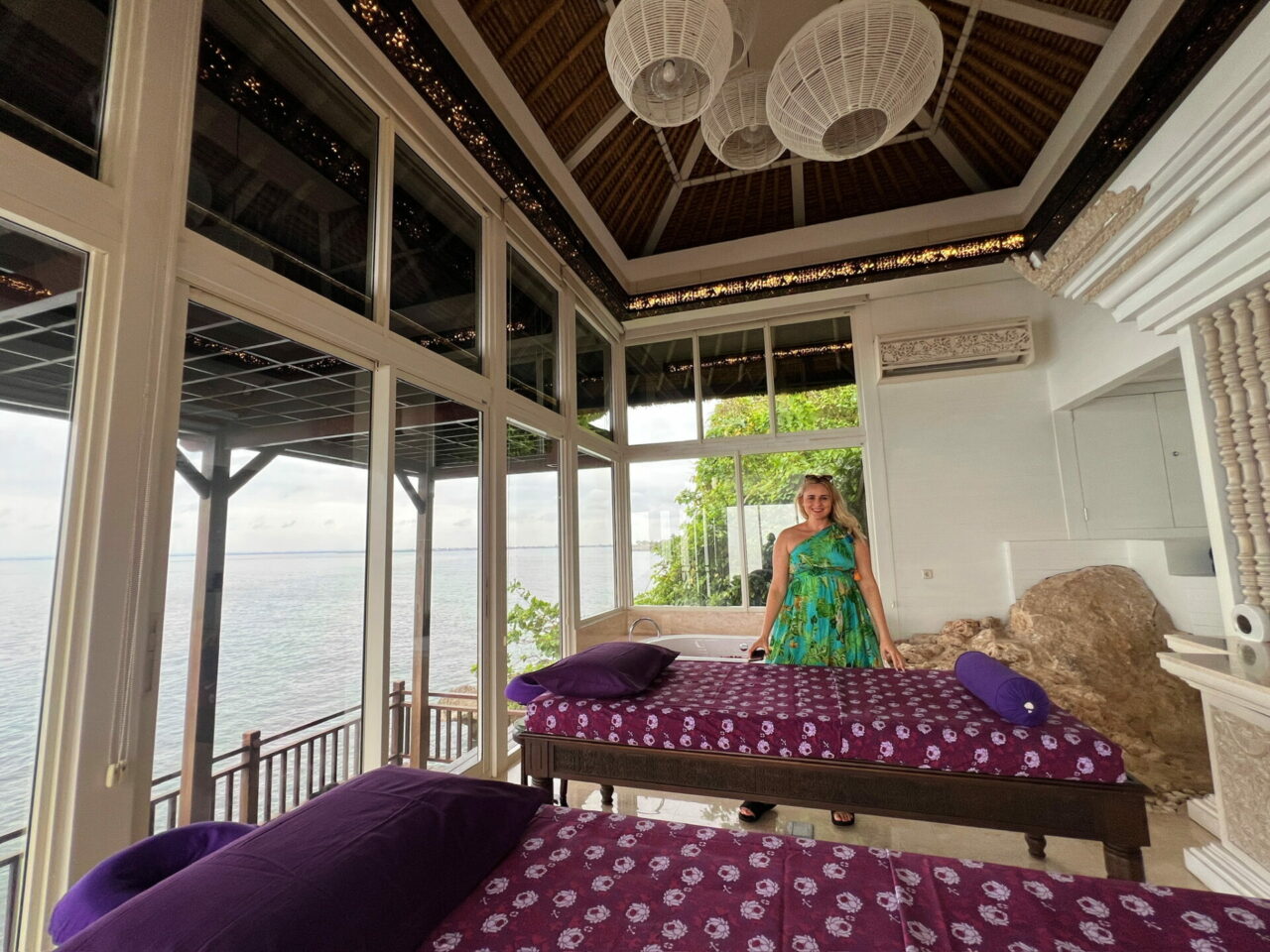 ayana resort spa at the rocks a spa room looking over the ocean with purple massage tables